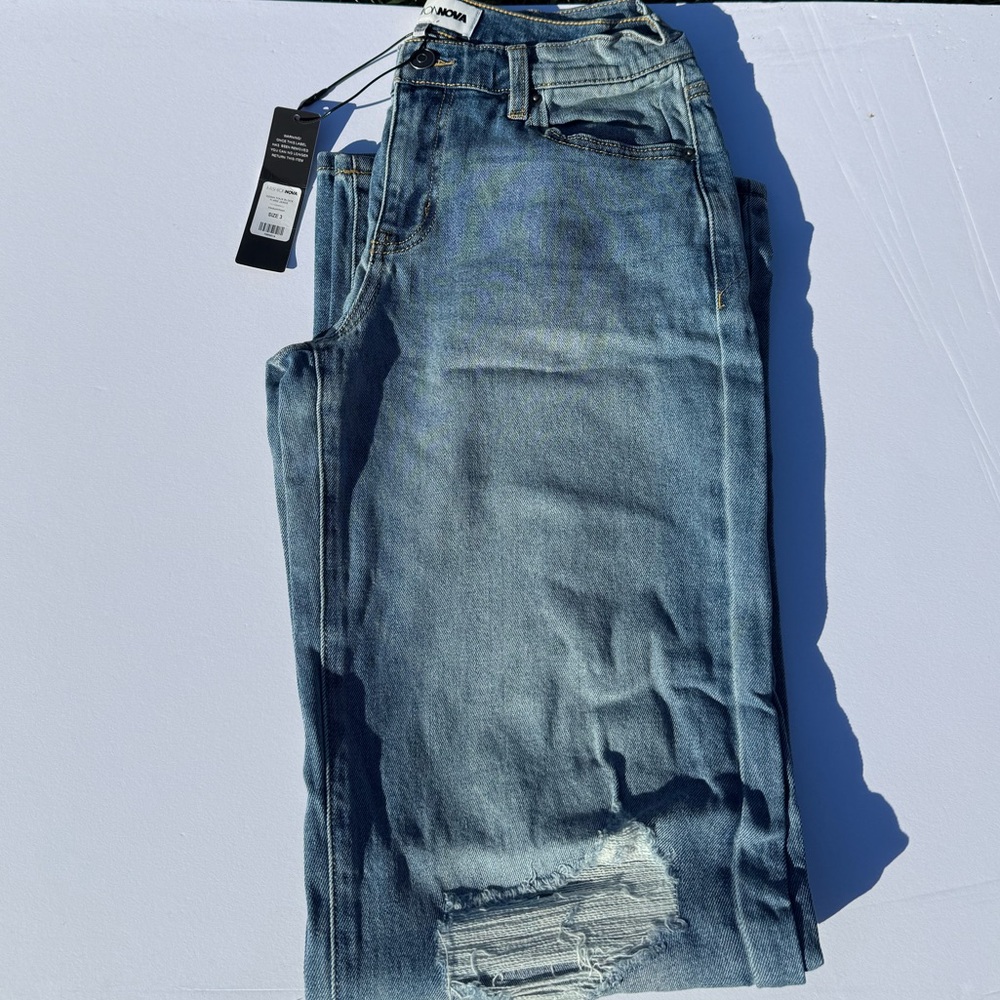 Fashion Nova Distressed Light Blue Skinny Jeans